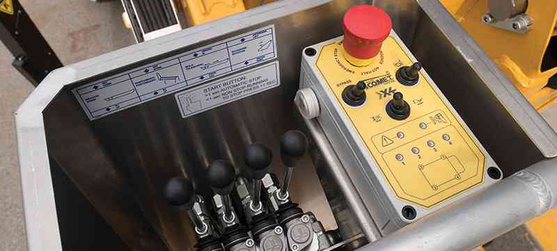 Hydraulic controls on the trailer mounted boom lift are easy to use and very precise.